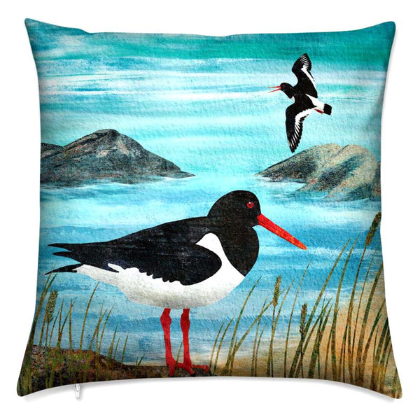 Oystercatcher cushion with two seabirds in a coastal scene.  Great as a coastal accessory or gift for bird lover or children. Artwork by Barbara Jane Art & Design.