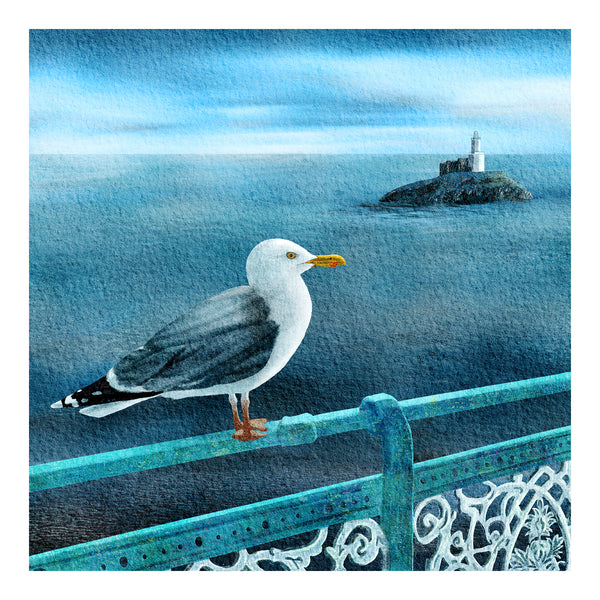 Herring Gull on ornate Victorian railings of Mumbles Pier with Mumbles Lighthouse in the background and a calm blue sea. 