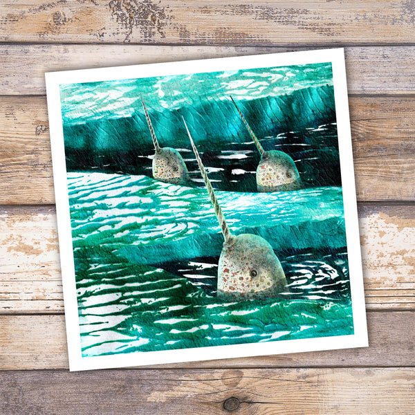 Giclée art print of three narwhals coming up for air among the sea ice. By Barbara Jane Art & Design. 