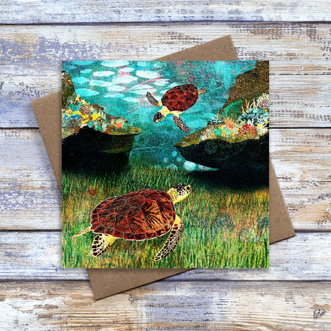 Sea Turtles Greetings Card.  Blank art card featuring two green turtles among coral and sea grass. Great birthday card for ocean life lover. Art by Barbara Jane Art & Design. 