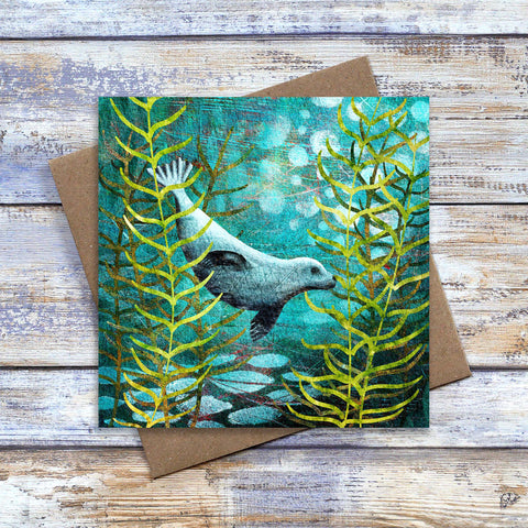 Seal greetings card.  Featuring harbour (common) seal swimming among kelp forest.  Great birthday card, thank you card, thinking of you card for marine life lovers. Artwork by Barbara  Jane Art & Design. 